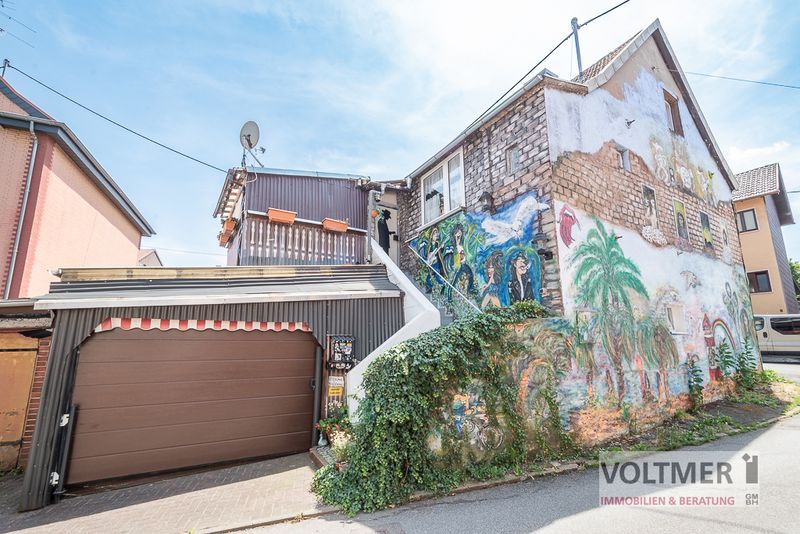 AUFFÄLLIG - Einfamilienhaus mit Garage und Einliegerwohnung in ruhiger Lage von Wiebelskirchen!